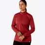 Person wearing a long sleeve dark red shirt that is a 1/4 zip and have Ariat written on the should in a pale pink color.