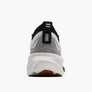 Back view of a gray and black athletic shoe on a white background