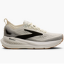 White running shoe with black accents on a white background