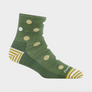 Green sock with light yellow and white polka dots and yellow stripes on the toes and heels of the sock.