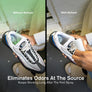 Image of a person spraying the inside of their shoe with odor neutralizer.