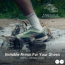 Image of someone stepping into a mud puddle but the shoe staying cleaning.