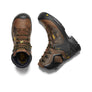 Pair of brown work boots with black soles on a white background