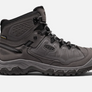 Sid view of a grey Keen hiking shoe that has the Keen logo on the side of the shoe against a white background.