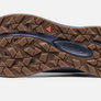 Sole of a shoe that is brown and dark blue and has the Keen logo in the middle of the sole.
