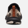 Back view of a tan shoe that has dark brown and orange accents against a white background.