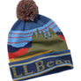 Navy blue winter hat that has a multi-colored mountain scene on it and LL Bean written in an olive green color on the flipped up part.