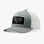 A white and grey hat that has a patch on the front that says find your own fish against a white abckground.