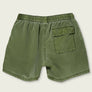 Green shorts with a pocket on a light gray background
