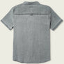 Back view of a light grey denim shirt with a blank background