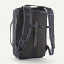 Back view of a grey backpack, showing the straps and a chest strap against a white background.