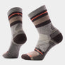 Pair of socks that is striped with different colors of brown.