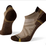 A pair of brown and beige Smartwool low ankle socks with light cushioning and a geometric pattern.