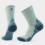 Light green socks with teal accents against a white background.