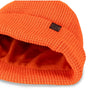 Bright orange hat with a brown tag on the flipped up part of the hat against a white background.