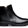 Black boot against a white background.
