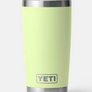 Pale yellow/green tumbler with the Yeti logo near the bottom of the cup against a white background