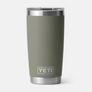 Dark Green cup with yeti etched into the bottom against a white background.