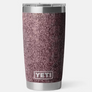 maroon and tan colored cup against a white background.