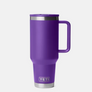 Large purple bottle with a handle that has the Yeti logo on the bottom of the cup against a white background.