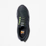 Top view of a black shoe with green accents, that has Timberland PRO logo on the insole of the shoe against a white background.