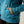 Up close picture of a person putting their hand into a hoodie pocket.