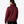 Back view of a person wearing a maroon color long sleeve shirt that has a collar against a grey background.