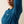 Person wearing a dark blue long sleeve holding their arm up to show the breathable fabric in the arm pit of the shirt.