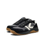 Black and gray Keen safety shoes with a white logo on a white background