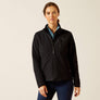 Person wearing a black jacket against a beige background.