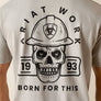 T-shirt with a skull wearing a hard hat and text on a beige background