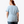 Person wearing a light blue t-shirt on a white background