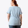 Person wearing a light blue t-shirt on a white background