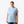 Woman wearing a light blue t-shirt with a small logo on a white background