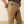 Up close image of a man wearing khaki pants with tools in his cargo pocket.