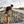 Man working on a construction site wearing khaki pants.