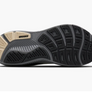 Black and beige sole of a shoe on a white background