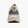 Back view of a gray and white athletic shoe on a white background