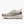 White running shoe with brown sole on a white background