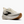 White running shoe with black accents on a white background