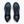 Pair of navy running shoes with white soles on a light gray background