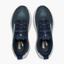 Pair of navy running shoes with white soles on a light gray background