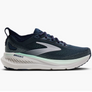 Navy running shoe with white sole on a white background