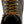 Brown work boot with yellow laces against a white background