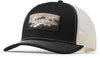 Black and White hat that has a Danner patch in the front against a white background.