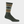 Green sock with multi colored strips and a black trout on the upper leg portion of the sock against a whit background.