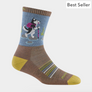 A brown sock with yellow, blue and green stripes across the top the foot and a dog with hiking sticks walking across rocks on the leg part of the sock.