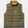 Tan colored puffer vest with orange on the inside agaisnt a white background.