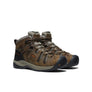 Pair mid height shoes that are brown and black.