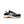 Black and white sneaker with brown sole on a white background